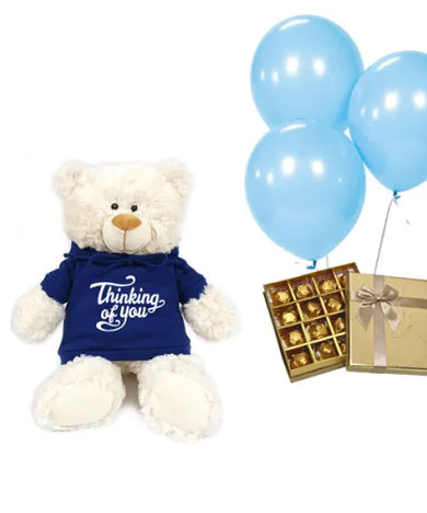 Send a heartfelt thinking of you gift with this teddy bear, chocolates & balloons set (UAE).