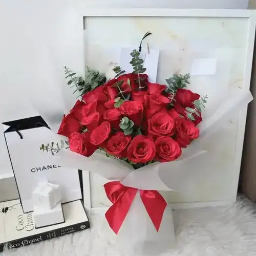 Stay With Me rose bouquet with 25 red roses and eucalyptus for delivery in Dubai, UAE