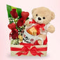 Sweet Surprise Gift Set with teddy, mug, chocolates, roses, and gypsophila for delivery in Dubai, UAE