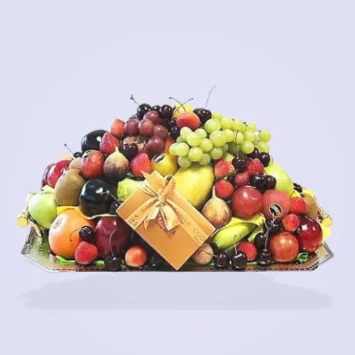 VIP Fruit Basket with exotic fresh fruits and Godiva chocolates in a silver tray.