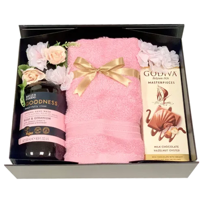 A Woman’s Favourite gift set UAE with Godiva chocolates, hand wash, and towel